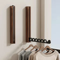 Folding wall coat rack